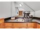 A wet bar with wooden cabinets, a sink, and a coffee maker at 2535 Winthrope Way, Lawrenceville, GA 30044