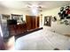A primary bedroom with ample storage is well lit by a ceiling fan with overhead lighting at 3750 Dial Mill Ne Rd, Conyers, GA 30013