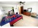 Bedroom featuring a ceiling fan, large window, and neutral paint at 3750 Dial Mill Ne Rd, Conyers, GA 30013