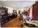 Dining room features hardwood floors, furniture, and chandelier lighting at 3750 Dial Mill Ne Rd, Conyers, GA 30013
