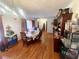Dining room features hardwood floors, chandelier, table, and storage shelf at 3750 Dial Mill Ne Rd, Conyers, GA 30013
