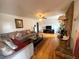 Spacious living room features hardwood floors, a stone fireplace, and an open layout at 3750 Dial Mill Ne Rd, Conyers, GA 30013