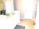 This bathroom features a large vanity and walk-in shower at 40 Pebble Brooke Ct, Covington, GA 30016