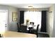 Cozy eat-in kitchen with stylish chairs, glass table, and lots of natural light at 40 Pebble Brooke Ct, Covington, GA 30016