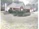 Brick home featuring large manicured landscaped yard at 40 Pebble Brooke Ct, Covington, GA 30016