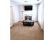 Cozy Gathering room features a white fireplace, neutral walls, and a dark wood coffee table at 40 Pebble Brooke Ct, Covington, GA 30016