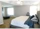 Spacious main bedroom features a king-size bed and ample natural light at 40 Pebble Brooke Ct, Covington, GA 30016
