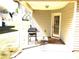 Covered patio with grill, ideal for outdoor cooking and relaxation at 40 Pebble Brooke Ct, Covington, GA 30016