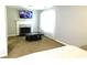 Sitting area in the main bedroom with fireplace and plenty of space at 40 Pebble Brooke Ct, Covington, GA 30016
