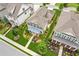 An aerial view of the beautiful home shows the lush landscaping and manicured lawn at 4155 Brookview Dr, Cumming, GA 30040