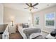 Bright bedroom with natural light, a ceiling fan, and comfortable furnishings at 4155 Brookview Dr, Cumming, GA 30040