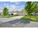 This home has attached garages and a long driveway at 4155 Brookview Dr, Cumming, GA 30040