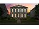 Charming home boasts a covered front porch and manicured front yard at 4155 Brookview Dr, Cumming, GA 30040
