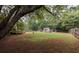 Expansive backyard featuring a shed, wooden playset, chicken coop, and full wooden perimeter fence at 5 White Pines Dr, Dallas, GA 30157