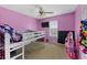 Pink bedroom featuring a bunk bed, small tv, and carpeted flooring at 5 White Pines Dr, Dallas, GA 30157