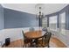Dining room with a chandelier and a view of the front yard at 5 White Pines Dr, Dallas, GA 30157