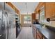 Long kitchen with stainless steel appliances and plentiful counter space at 5 White Pines Dr, Dallas, GA 30157