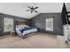 Spacious main bedroom with a king bed, vaulted ceiling, and neutral carpet at 5 White Pines Dr, Dallas, GA 30157