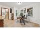 Sunny breakfast nook with charming decor and views of treelined backyard at 950 Ivy St, Cumming, GA 30041