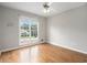 Bedroom with hardwood floors, large windows, and ample natural light at 108 Faraday Dr, Douglasville, GA 30134