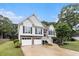 Charming two-story home with a two car garage and a stone foundation at 108 Faraday Dr, Douglasville, GA 30134