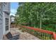 Wood deck with nice backyard and wooded views; offers peaceful enjoyment at 2018 Township Dr, Woodstock, GA 30189