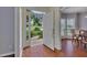Inviting foyer showcasing hardwood floors, natural light, and a view to the landscaped front yard at 2018 Township Dr, Woodstock, GA 30189