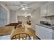 Kitchenette with tiled flooring, sink and an adjacent dining area with bench seating at 2018 Township Dr, Woodstock, GA 30189