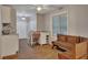 Cozy kitchen with a small sink and adjacent dining area with a wooden bench at 2018 Township Dr, Woodstock, GA 30189