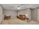 Neutral living room features a comfortable couch and space for entertaining at 2018 Township Dr, Woodstock, GA 30189