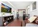 Open basement area with living room, kitchen area, and tile flooring throughout at 677 Holmes Nw St, Atlanta, GA 30318