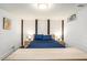 Finished basement bedroom with wooden posts and white-painted brick at 677 Holmes Nw St, Atlanta, GA 30318