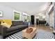 Open-concept living space flows into the kitchen, providing ample room for entertaining and relaxing at 677 Holmes Nw St, Atlanta, GA 30318