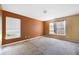 A well-lit bedroom is ready for remodeling with space and natural light at 6770 Gordon Manor Sw Ct, Mableton, GA 30126