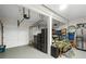 Organized two-car garage with plenty of storage space and epoxy flooring at 10735 Pinewalk Forest Cir, Alpharetta, GA 30022