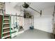 Clean garage with ample storage space and garage door opener at 10735 Pinewalk Forest Cir, Alpharetta, GA 30022