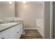Relaxing bathroom with a single vanity sink and a soaking tub at 1501 Buckingham, Stockbridge, GA 30281