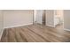 Comfortable bedroom with new flooring and easy access to the en-suite bathroom at 1501 Buckingham, Stockbridge, GA 30281