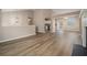 Open-concept living area showcasing modern flooring and seamless flow to the kitchen at 1501 Buckingham, Stockbridge, GA 30281