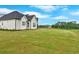 Spacious, well-manicured backyard of the modern farmhouse style home at 152 Palisade Dr, Rydal, GA 30171