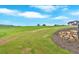 Landscaped backyard with stone border and spacious lawn at 152 Palisade Dr, Rydal, GA 30171