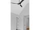 A bedroom with two doors and an overhead fan at 152 Palisade Dr, Rydal, GA 30171