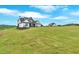 Stunning modern farmhouse nestled on a lush green lawn with picturesque countryside views at 152 Palisade Dr, Rydal, GA 30171