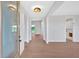 Bright and airy foyer showcasing hardwood floors and stylish lighting fixtures at 152 Palisade Dr, Rydal, GA 30171