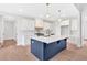 Kitchen with center island with sink, white cabinets, and stainless steel appliances at 152 Palisade Dr, Rydal, GA 30171