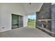 Covered patio with stone fireplace and a sliding glass door at 152 Palisade Dr, Rydal, GA 30171