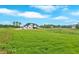 The grassy property and lawn surrounding the home at 152 Palisade Dr, Rydal, GA 30171
