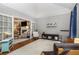 Comfortable bonus room featuring white walls, hardwood floors and neutral furniture at 2804 Stillwater Park Dr, Marietta, GA 30066