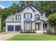 Charming two-story home with blue shutters, gray roof, and lush green lawn at 2804 Stillwater Park Dr, Marietta, GA 30066