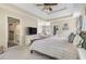 Comfortable main bedroom with sitting area, TV, and a door to the bathroom at 2804 Stillwater Park Dr, Marietta, GA 30066